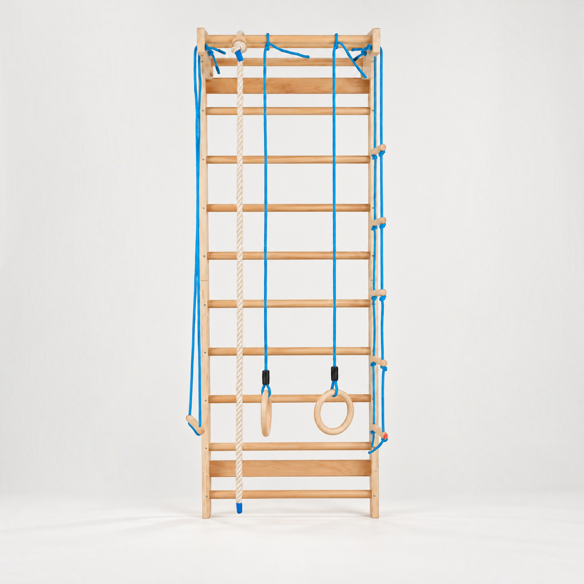 modplay Montessori wooden indoor climbing gym with ladder, rope, rings, and trapeze for active play