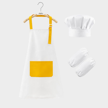 modplay My First Little Chef bundle featuring a white and yellow kids apron, chef hat, and matching arm sleeves.
