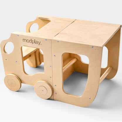 modplay 3-in-1 Montessori learning tower in natural wood, converted into a child's desk and chair set.