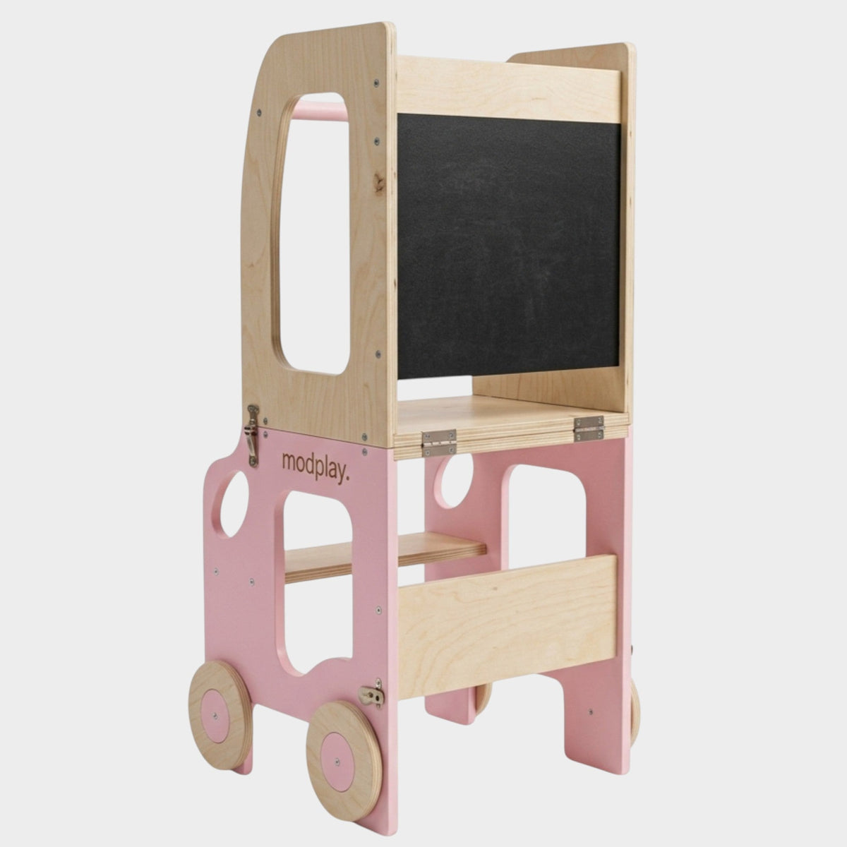 modplay 3-in-1 Montessori learning tower in light wood and soft pink with a built-in chalkboard for toddlers.