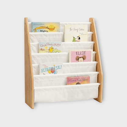 modplay Montessori wooden bookshelf with white fabric slings displaying children's books at eye level